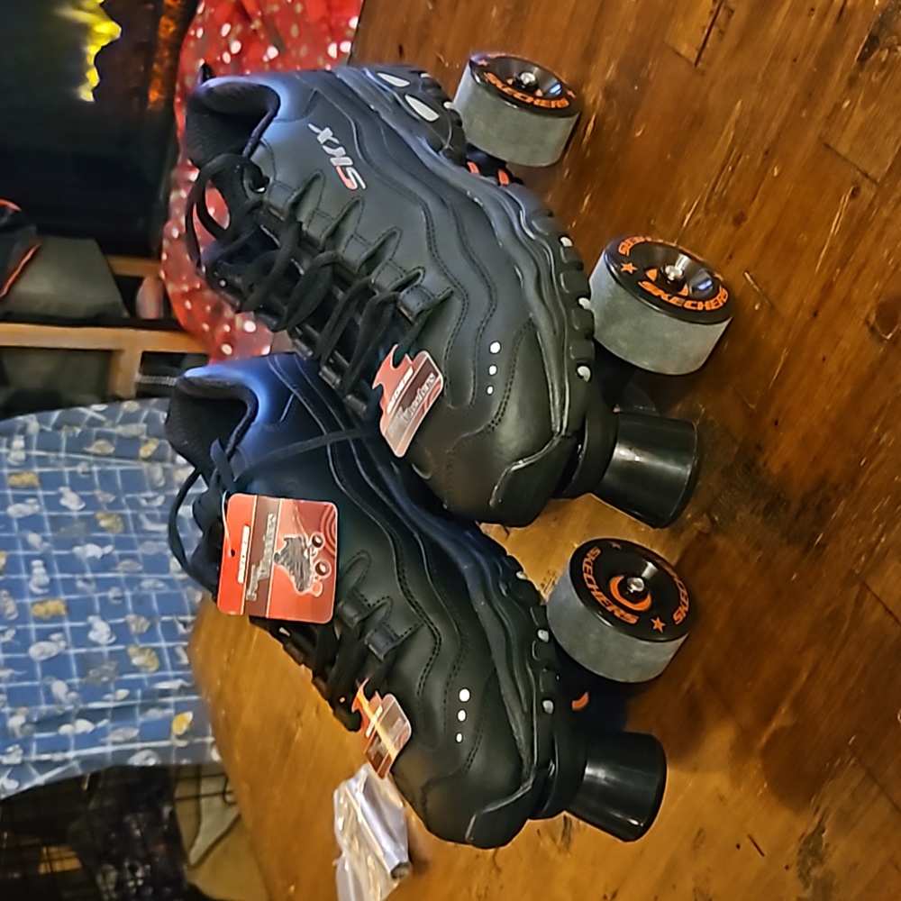 Sketchers 4 wheelers size mens 8.5, black